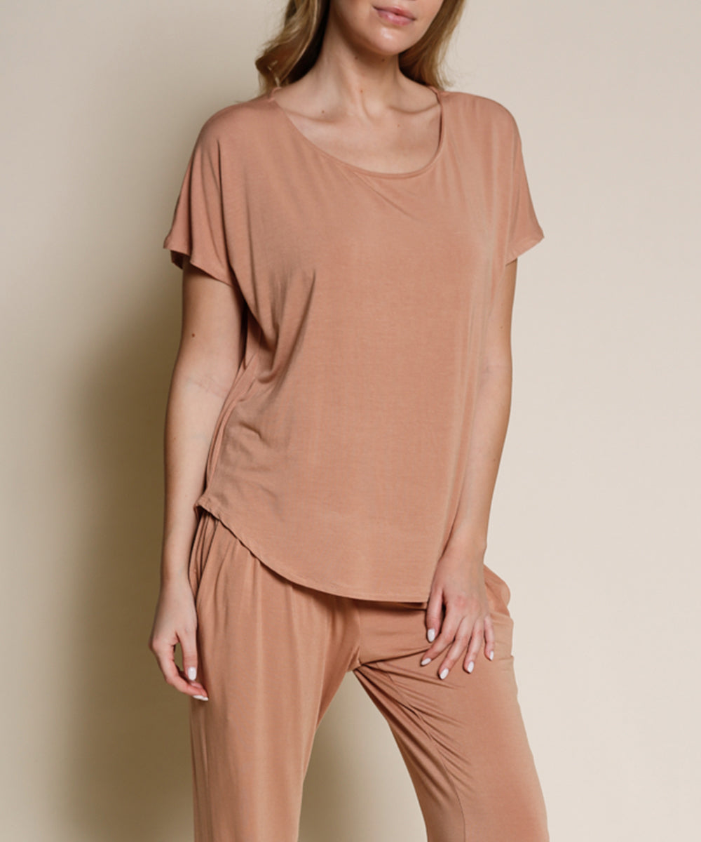 A bamboo dolman t-shirt design, with a high-low hemline and boat neck design.