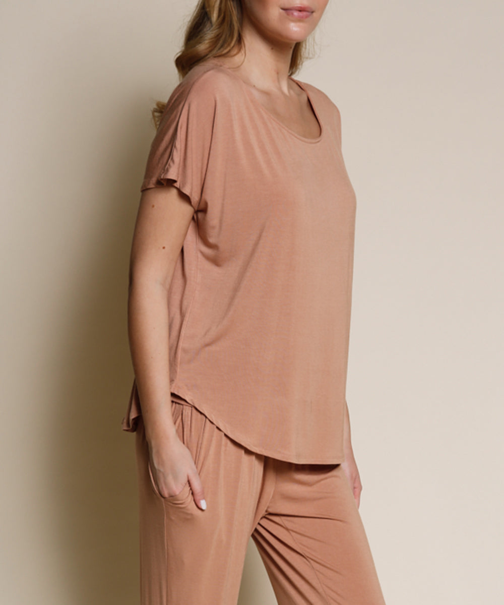 A bamboo dolman t-shirt design, with a high-low hemline and boat neck design.