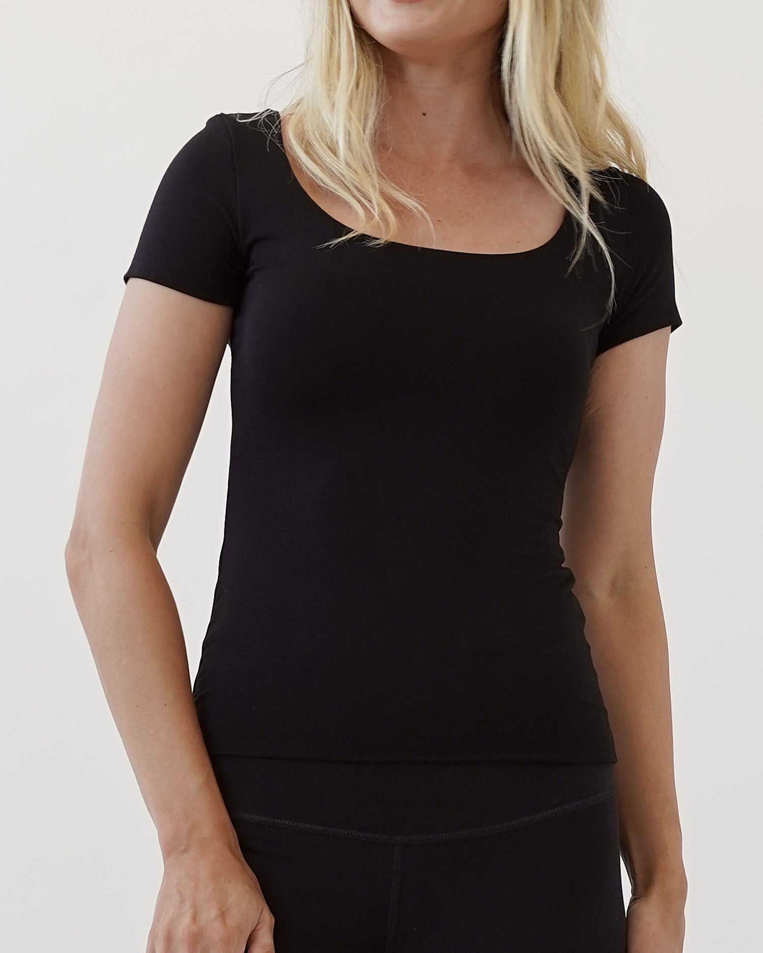 A bamboo black double layered cap sleeve top.