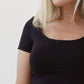A bamboo black double layered cap sleeve top.