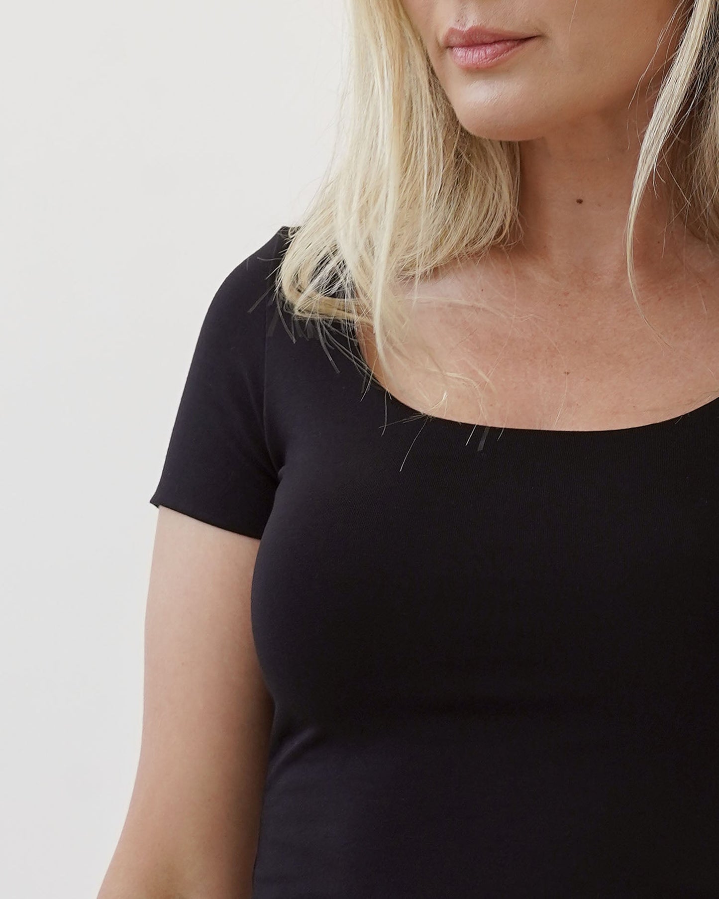 A bamboo black double layered cap sleeve top.