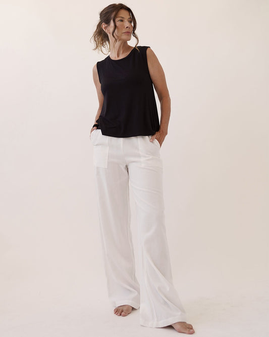 A bamboo linen pant with wide leg fit, pockets, and elasticized waistband.