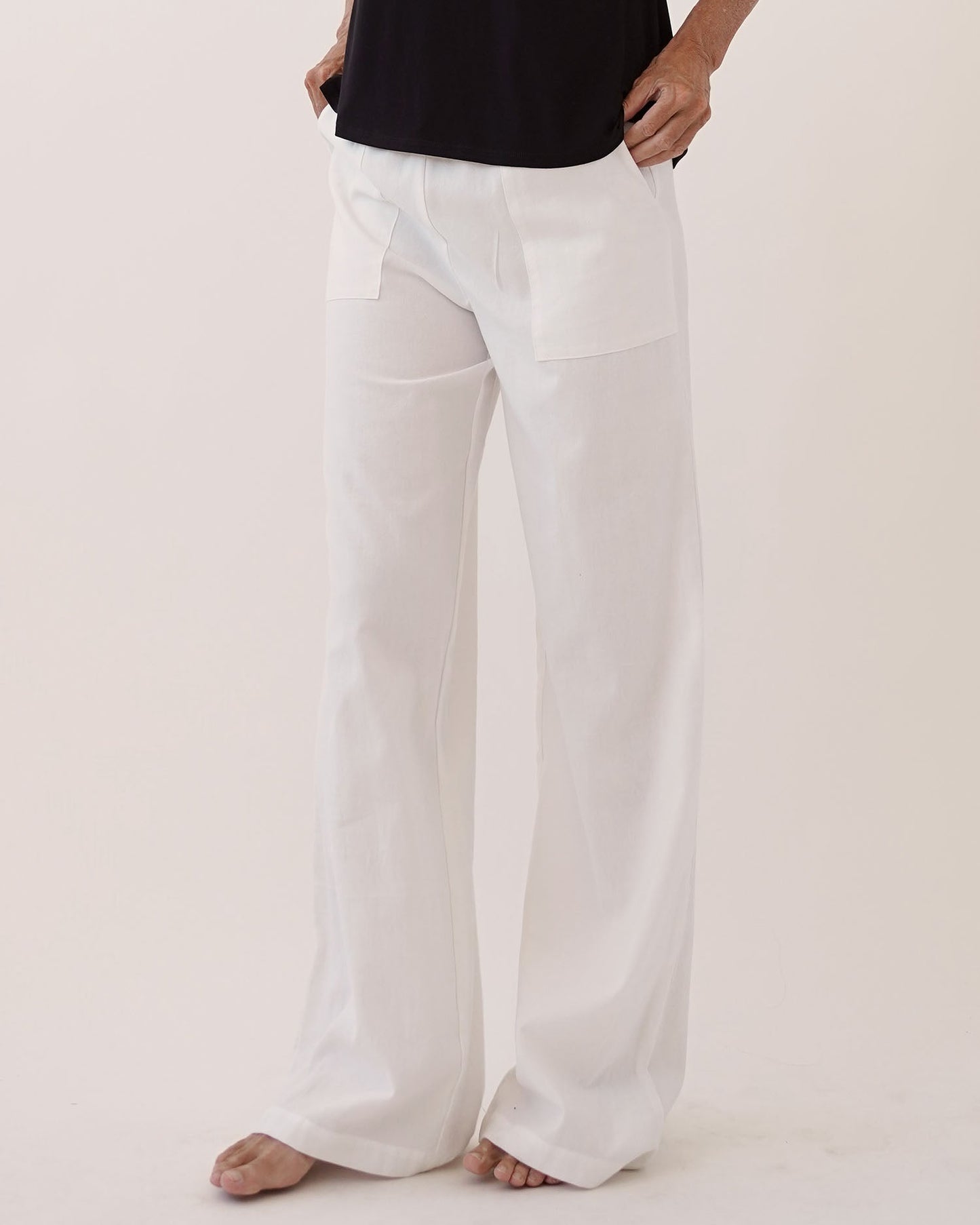 A bamboo linen pant with wide leg fit, pockets, and elasticized waistband.