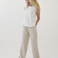 A bamboo linen pant with wide leg fit, pockets, and elasticized waistband.