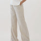 A bamboo linen pant with wide leg fit, pockets, and elasticized waistband.