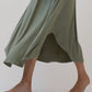 A bamboo maxi skirt with smocked waist and flared hemline