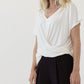 A bamboo ivory twist front dolman top