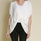 A bamboo wrap cardigan with twist center and flowing sleeves