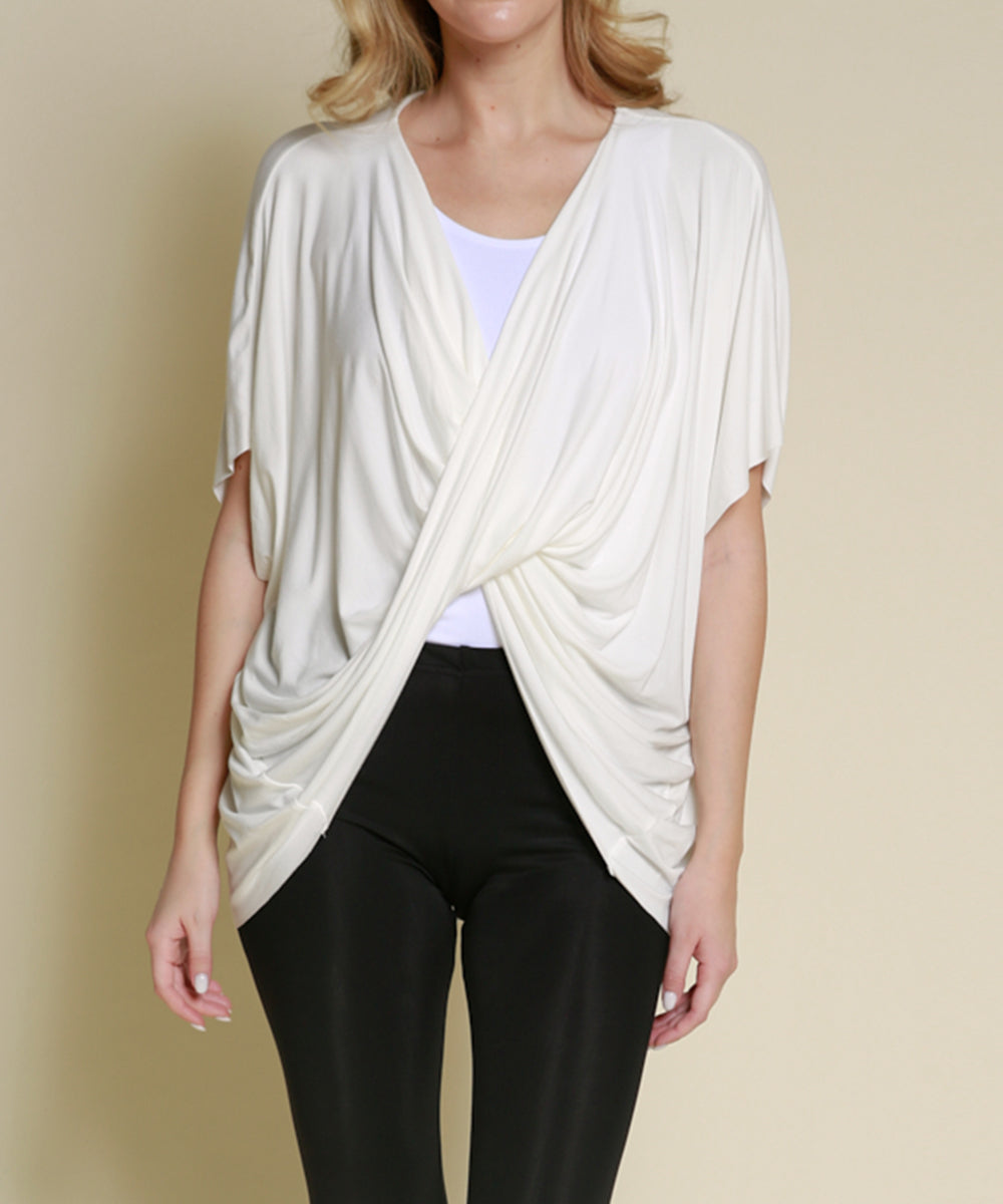 A bamboo wrap cardigan with twist center and flowing sleeves